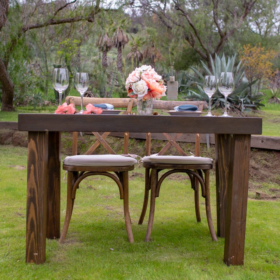 sweet heart table on the grounds with beautiful nature backdrop