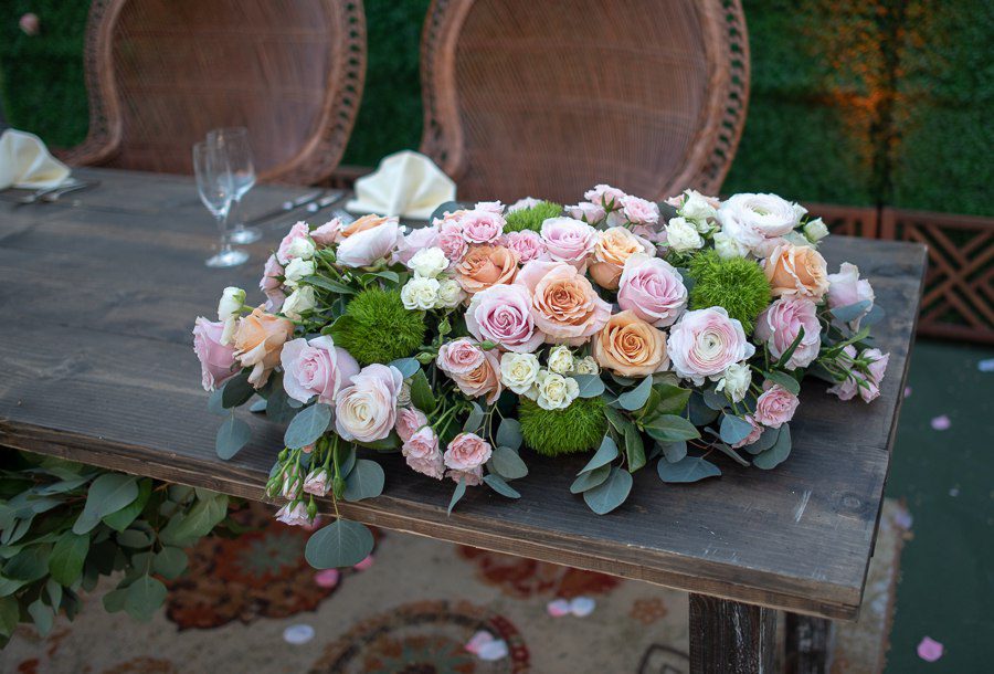 pretty floral sweetheart table bouquet 