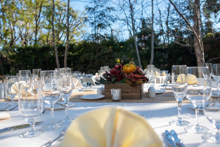 wedding dinner table set up with beautiful succulent center piece in the beverly park outdoor space