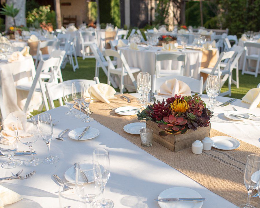 view of tables with white linen at the Garland